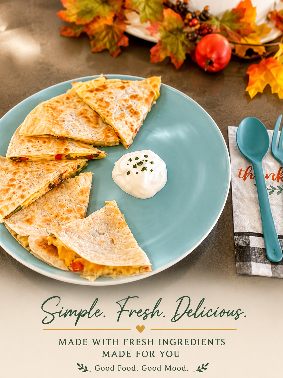 Fresh vegetable and cheese quesadilla sliced and served with sour cream